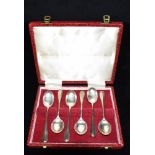 A CASED SET OF SIX SILVER TEASPOONS The spoons of Rat tail design, hallmarked for Sheffield 1975,