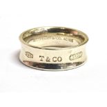 TIFFANY & CO SILVER 1837 RING Boxed, with receipt, the outer band marked 925 T & Co 1837, shank