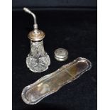 A SILVER TOPPED ATOMIZER, PILL BOX AND PIN TRAY The silver topped atomizer with cut glass body,