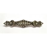 EARLY 20TH CENTURY DIAMOND BROOCH The brooch of geometric design fitted with numerous old single cut