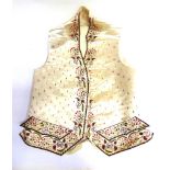 COSTUME - A LATE 18TH CENTURY GENTLEMAN'S EMBROIDERED IVORY SILK WAISTCOAT with elaborate floral and