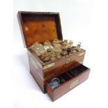 A VICTORIAN BRASS-MOUNTED MAHOGANY TRAVELLING OR CAMPAIGN APOTHOCARY'S CABINET the fitted interior