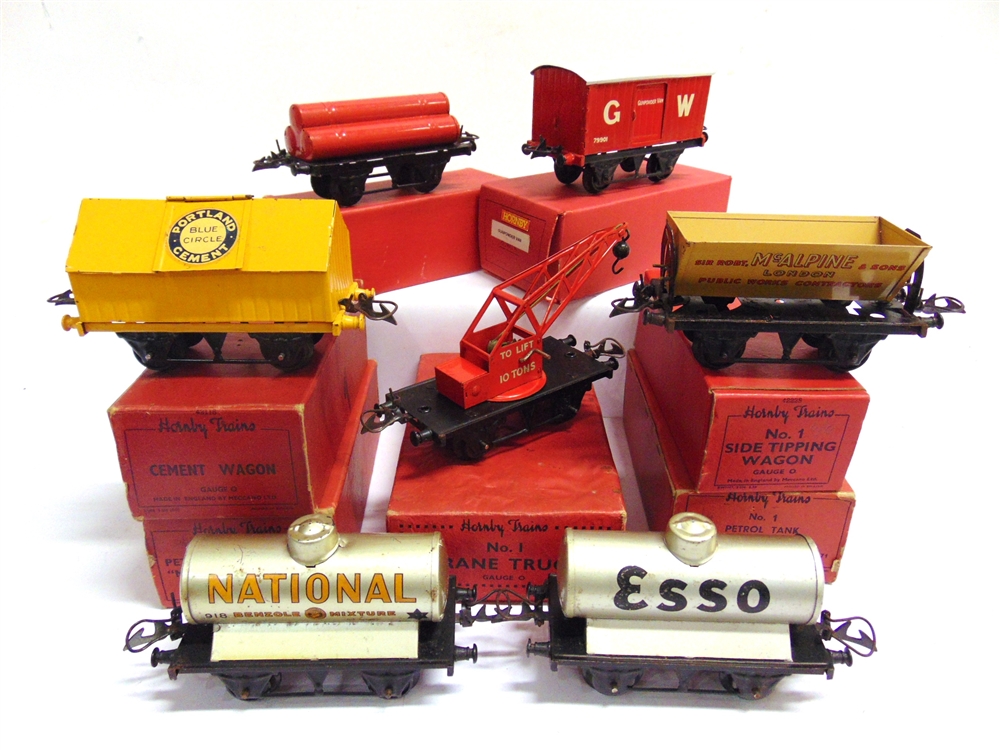 [O GAUGE]. SEVEN HORNBY WAGONS comprising a Petrol Tank Wagon 'National Benzole'; Petrol Tank