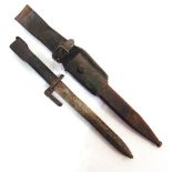 A FALKLANDS WAR ARGENTINE FAL BAYONET the 19.5cm blade unmarked, the pommel with impressed number '