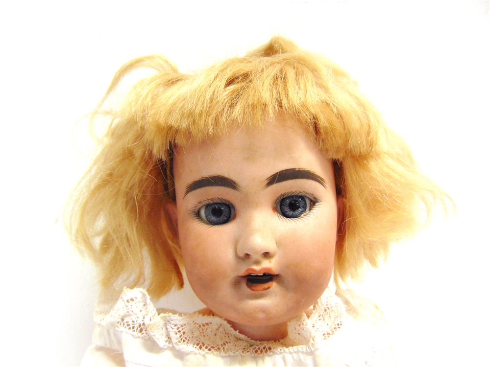 A SIMON & HALBIG BISQUE SOCKET HEAD DOLL with a blonde wig, sleeping blue glass eyes, pierced - Image 2 of 2