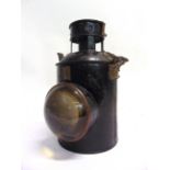 A GREAT WESTERN RAILWAY BULLS-EYE SIGNAL LAMP complete with burner and reservoir, with cast brass