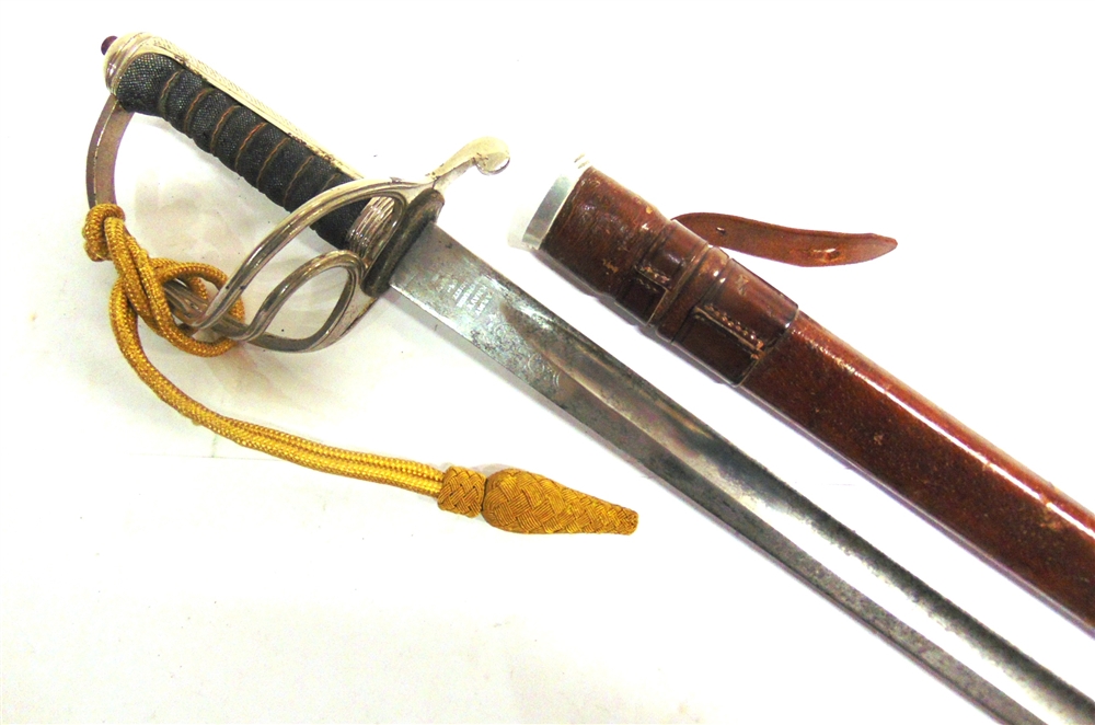 A BRITISH 1821 PATTERN OFFICER'S SWORD the 89cm slightly curved polished blade with indistinctly