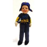 A NORAH WELLINGS CLOTH ADMIRAL DOLL with a blue uniform, yellow belt and cuff facings, and a blue