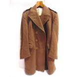 A SECOND WORLD WAR BRITISH WOMEN'S LAND ARMY GREATCOAT by Steinberg & Sons Ltd, dated 1942, of brown