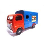 A TRI-ANG PRESSED STEEL HORSE TRANSPORTER red and blue, generally good condition, 47cm long.