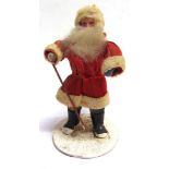 A BISQUE FATHER CHRISTMAS OR SANTA CLAUS DOLL the head with painted facial features and a long white