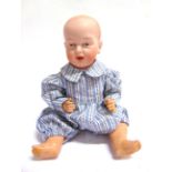AN EISENMANN BISQUE SOCKET HEAD CHARACTER DOLL in the style of a Kaiser baby, with painted hair