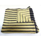 A WELSH WOOL SINGLE-LOOM HEAVYWEIGHT BLANKET in navy blue and cream stripes, approximately 186cm x