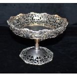 A SILVER PEDESTAL TAZZA the tazza with pierced fluted decoration to the sides and base, hallmarked