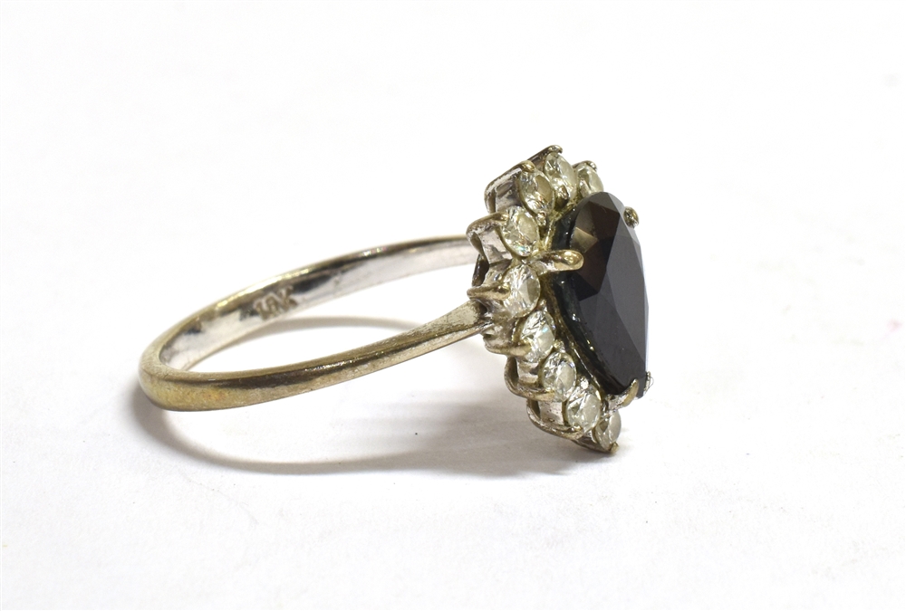 A STAMPED 18CT DIAMOND AND SAPPHIRE CLUSTER RING the facetted pear shaped sapphire measuring 10 x - Image 2 of 6