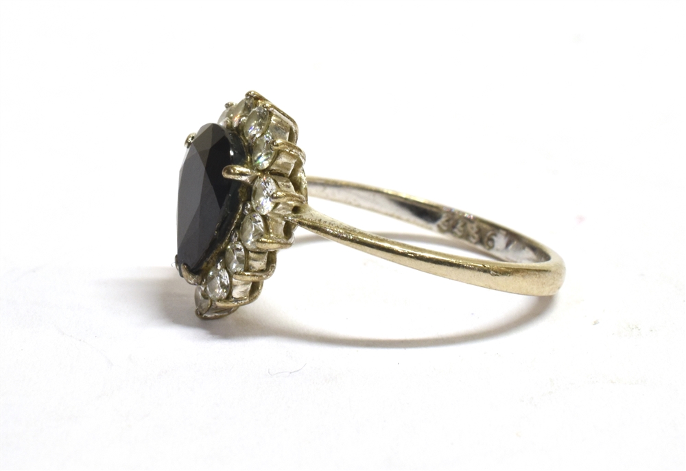 A STAMPED 18CT DIAMOND AND SAPPHIRE CLUSTER RING the facetted pear shaped sapphire measuring 10 x - Image 3 of 6