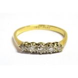 A MARKED 18CT PLAT, DIAMOND FIVE STONE DRESS RING Ring size R ½ weight 2.7g, and measuring 2mm
