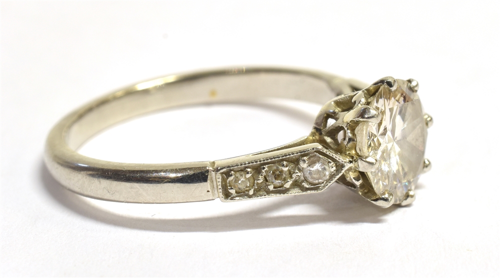 A PLATINUM AND EUROPEAN CUT DIAMOND RING The principal diamond, coronet set, with three old cut - Image 2 of 5