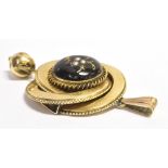 A LATE 19TH/EARLY 20TH CENTURY BLACK ENAMEL AND SEED PEARL PENDANT the circular pendant with bell