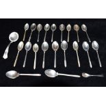 A COLLECTION OF SILVER SPOONS twenty teaspoons, one strainer, one salt spoon, weight 244g