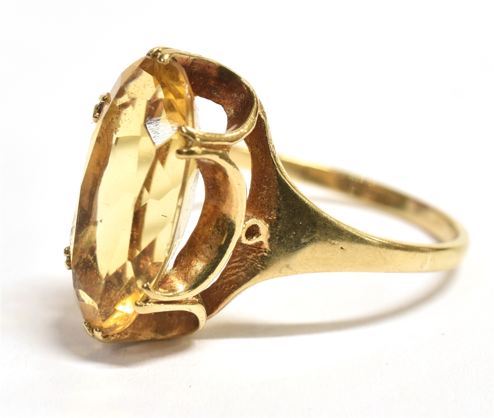 A 9CT GOLD 'HONEY' COLOURED GARNET COCKTAIL RING The oval faceted gem measuring 1.5 x 0.9cm, shank - Image 3 of 4