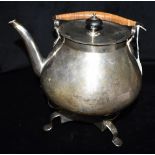 ANTIQUE SILVER KETTLE WITH BURNER STAND the silver kettle of plain form with wicker effect swing