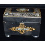 A SMALL VICTORIAN TWIN COMPARTMENT PAPER MACHE TEA CADDY with mother-of-pearl decoration, 15cm