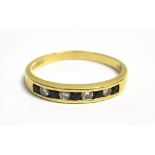 AN 18CT GOLD, DIAMOND AND SAPPHIRE HALF ETERNITY BAND RING Hallmarked London 1986, ring size T ½,