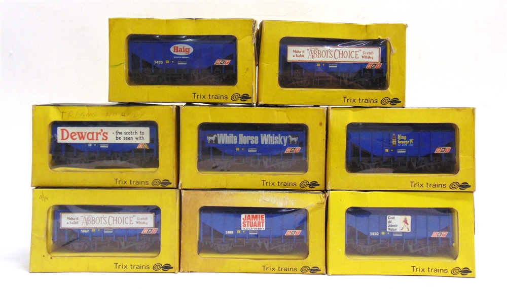 [OO GAUGE]. EIGHT TRIX BULK GRAIN WAGONS each boxed (three boxes with one end flap missing return