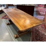 A REFRECTORY DINING TABLE the substantial single plank top 77cm wide, 212cm long, on shaped supports