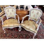 A PAIR OF LOUIS XV STYLE OPEN ARMCHAIRS with painted and carved wood frames, floral upholstered