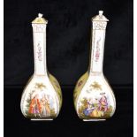 A PAIR OF DRESDEN LIDDED VASES decorated with alternating panels of courting couples and floral