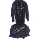 A NATIONAL FIRE SERVICE FIREMAN'S DOUBLE-BREASTED TUNIC dark blue-black wool; together with an N.F.