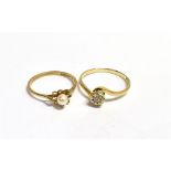 TWO VINTAGE 9CT GOLD RINGS An illusion diamond set crossover ring, shank marked DIA, worn 375