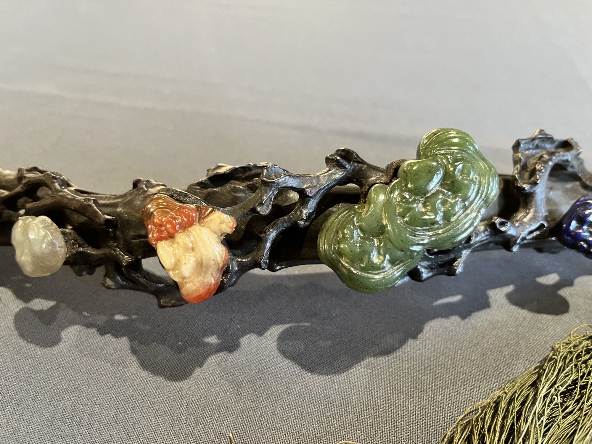 A CHINESE RUYI SCEPTRE of traditional form, with eight jade type carvings mounted on a - Image 3 of 21