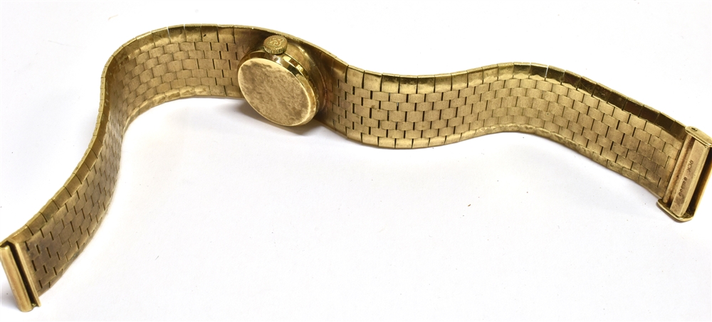 A 9CT GOLD LADIES WRISTWATCH The oval signed dial on an integral textured brick strap, the clasp - Image 4 of 4