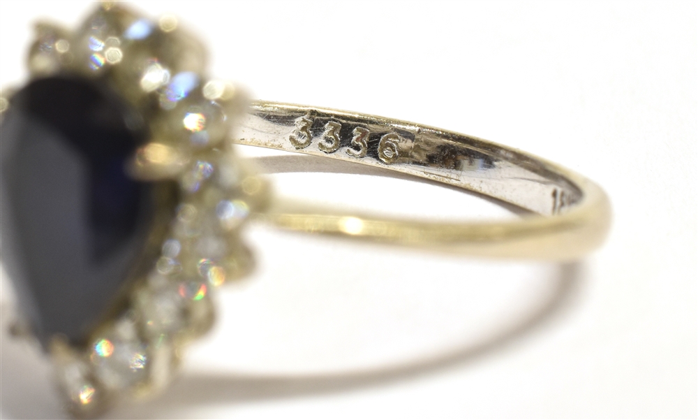 A STAMPED 18CT DIAMOND AND SAPPHIRE CLUSTER RING the facetted pear shaped sapphire measuring 10 x - Image 6 of 6