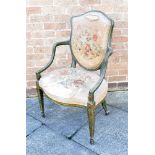 A LOUIS XVI STYLE OPEN ARMCHAIR the shield shaped back and serpentine front seat with needlework