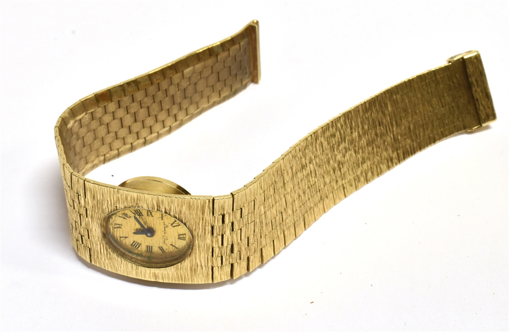 A 9CT GOLD LADIES WRISTWATCH The oval signed dial on an integral textured brick strap, the clasp - Image 3 of 4