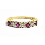 VINTAGE 18CT GOLD, DIAMOND AND RUBY HALF ETERNITY RING the ring set with three alternating