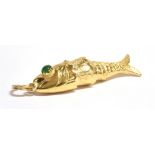 AN ARTICULATED FISH PENDANT PIECE the fish of yellow metal independently assessed as 18ct gold