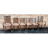 A SET OF SIX MATCHING RUSH SEAT LADDERBACK DINING CHAIRS including a pair of carvers Condition