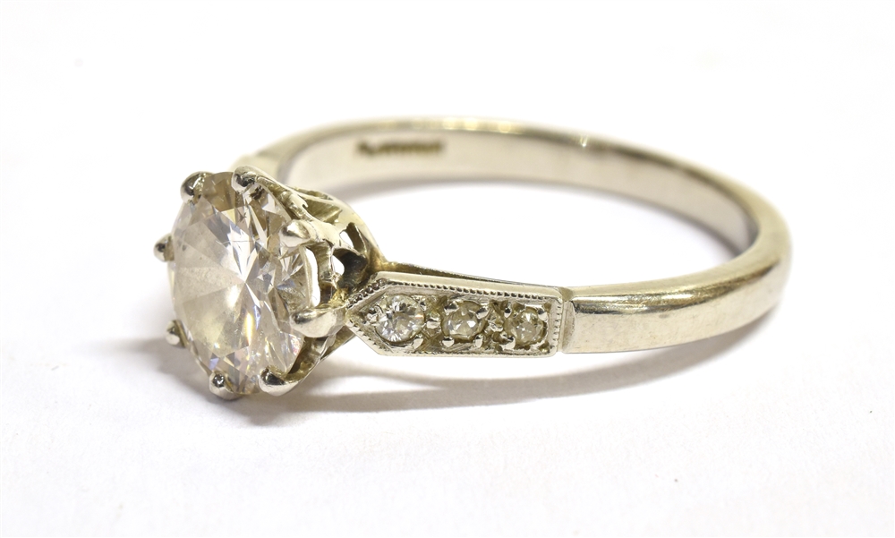 A PLATINUM AND EUROPEAN CUT DIAMOND RING The principal diamond, coronet set, with three old cut - Image 3 of 5