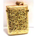 AN EDWARDIAN 9CT ROSE GOLD VESTA CASE the case engraved all over with foliate scroll, vacant