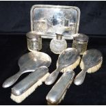 A NINE PIECE SILVER DRESSING TABLE MATCHED SET The set comprising silver tray 29.5cm x 20.5 weight