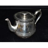 ELKINGTON AND CO PLATED TEA POT The tea pot with engraved pattern and crest, base stamped