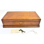 A VICTORIAN OAK BOX with brass carrying handles, complete with key, 39cm wide 22cm deep 10cm high