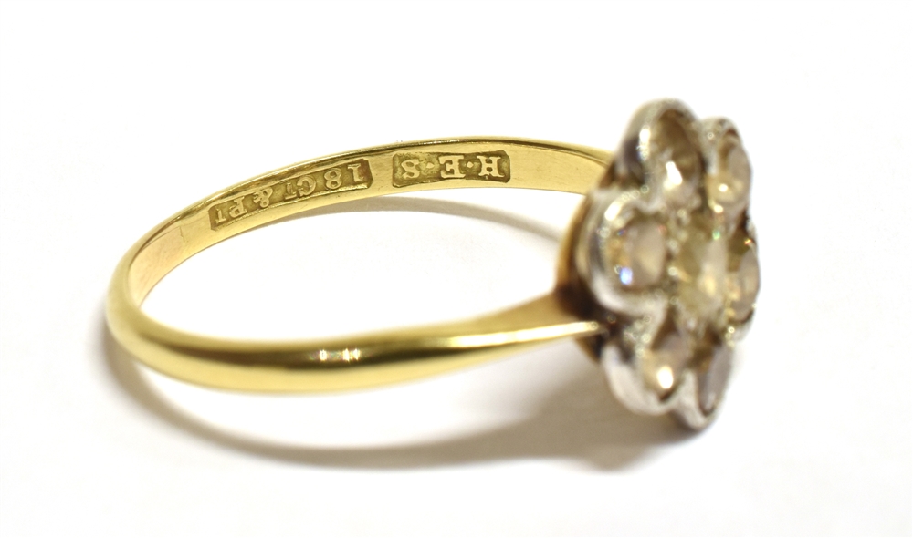 AN ART DECO DAISY DIAMOND RING The ring set with a daisy head comprising of transitional cut - Image 4 of 5