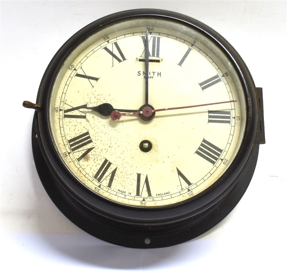 A SMITHS 8-DAY SHIPS BULKHEAD WALL CLOCK in black painted case, 22cm diameter Condition Report :