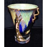 A LARGE CARLTON WARE TWIN HANDLED LUSTRE VASE of trumpet form with ribbed lower body, decorated with